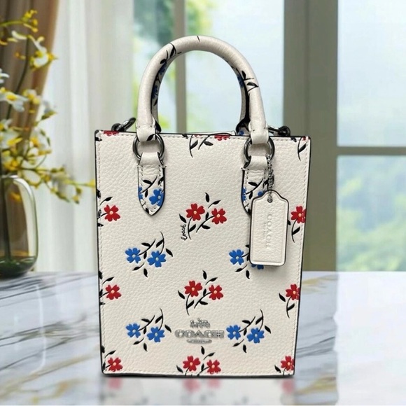 Coach Handbags - Coach Cream Mini Bag with Red and Blue Floral Design